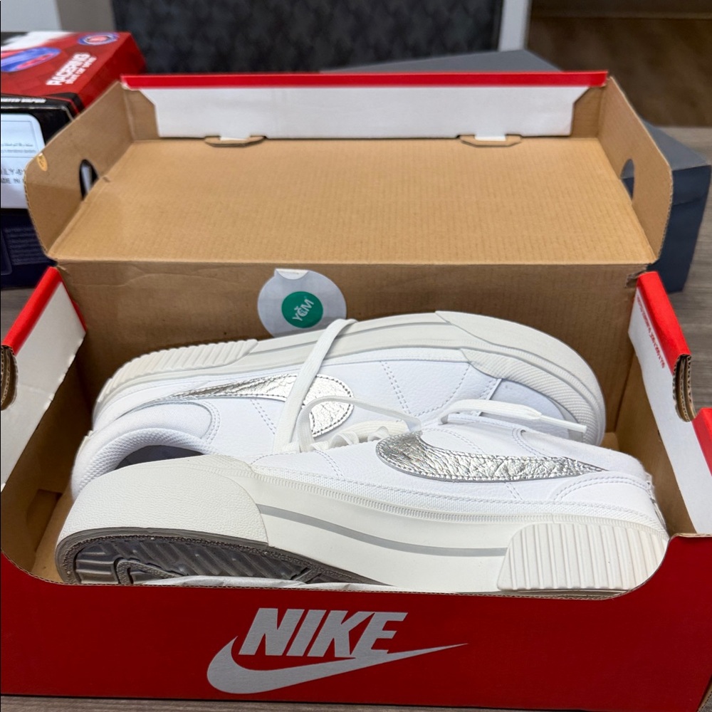 Nike Kids White Sneakers with Silver Accents
